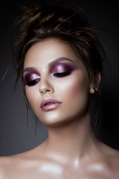 istock Beautiful woman with professional make up 670004728