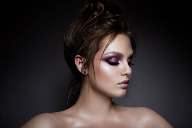 istock Beautiful woman with professional make up 670004880