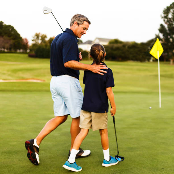 istock Father and Daughter Golf 670007504