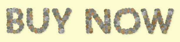 istock BUY NOW – Coins on yellow background 670019596