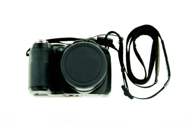 istock top view of camera on white background. 670027566