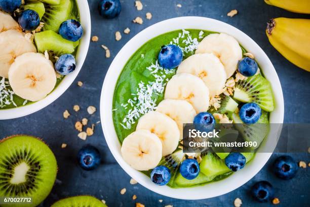 Green Smoothie Bowl With Banana Kiwi Blueberry Granola Stock Photo - Download Image Now