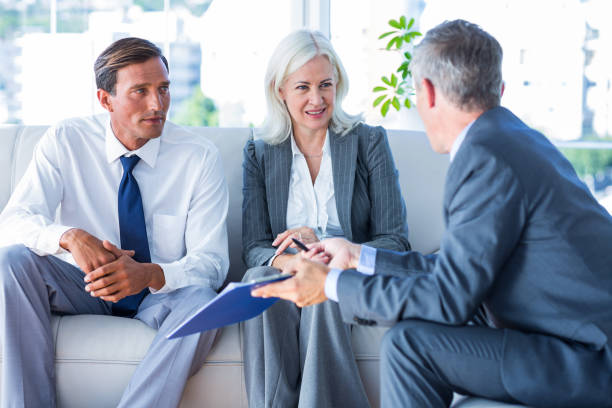 istock Business people speaking together on couch 670034214