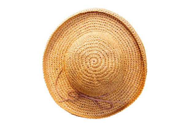 istock Pretty straw hat with bow on white background. Beach hat top view isolated 670034302