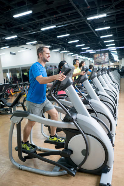 istock Athletic people working out at the gym 670044990