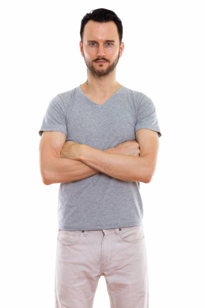 istock Studio shot of young man standing with arms crossed 670045276