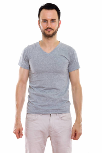 istock Studio shot of young man standing against white background 670045290