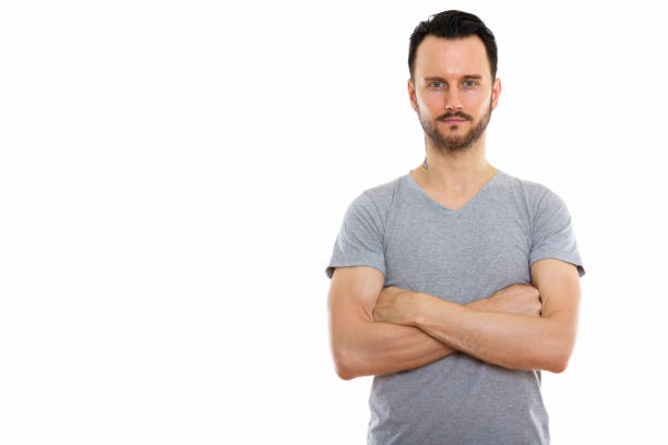 istock Studio shot of young man with arms crossed 670045296