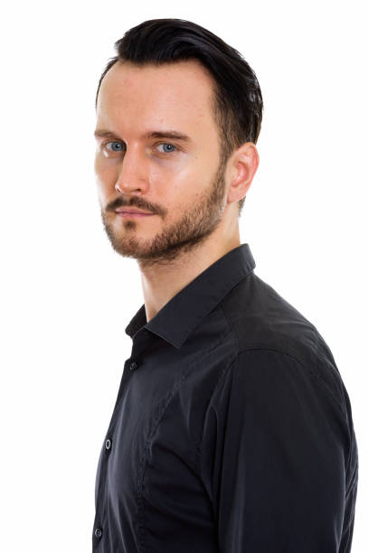 istock Studio shot of young handsome businessman looking at camera 670050024