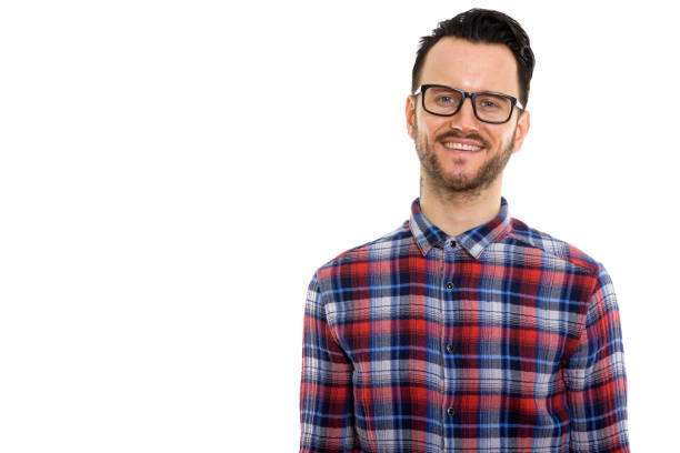 istock Studio shot of happy young man smiling while wearing eyeglasses 670055582