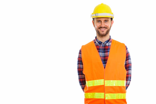 istock Studio shot of happy young man construction worker smiling 670058444