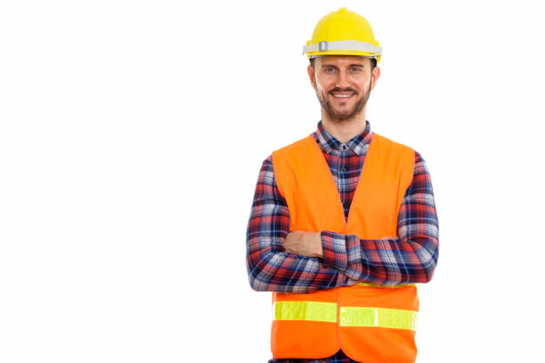 istock Studio shot of happy young man construction worker smiling with arms crossed 670060492