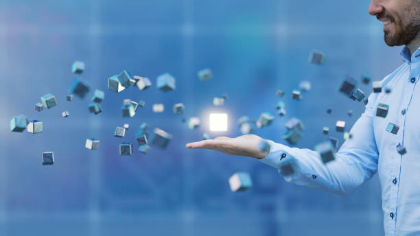 Businessman with flying cubes Businessman with flying cubes. innovation technology stock pictures, royalty-free photos & images