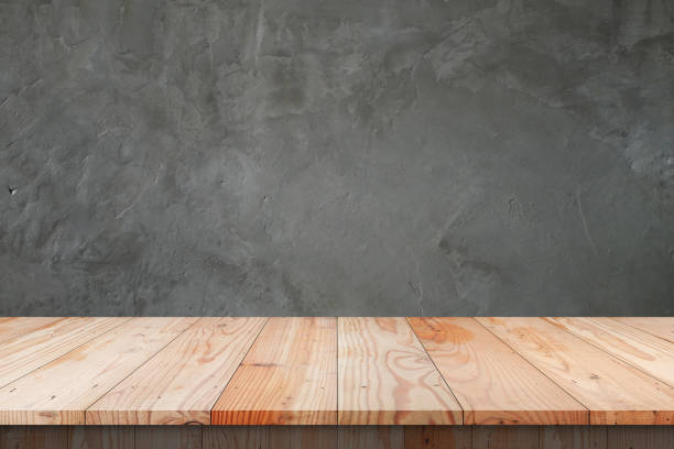 istock Empty top shelves or table wood on concrete wall background.For put product and some thing 670061368