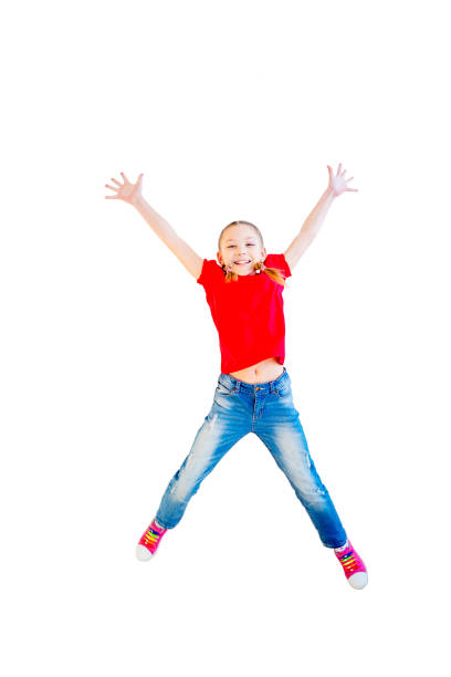 istock Happy girl jumping 670065670
