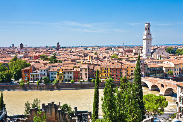 istock Verona panoramic view from the hill over the medieval city with river 670065928