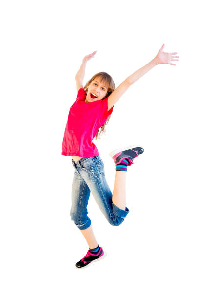 istock Happy girl jumping 670068948