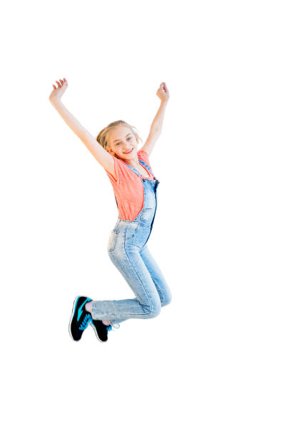 istock Happy girl jumping 670069612