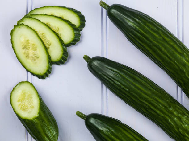 istock Fresh Sliced Ripe Salad Cucumber 670072104