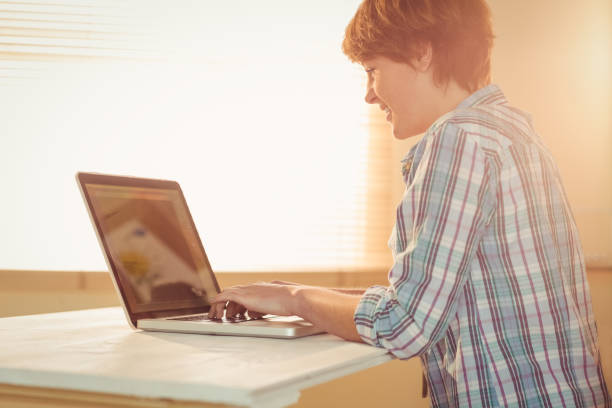 istock Casual businesswoman using her laptop 670075920