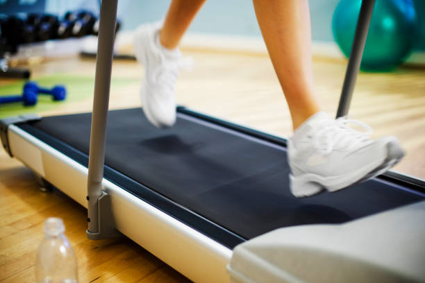 istock Woman Running on a Treadmill 670080002