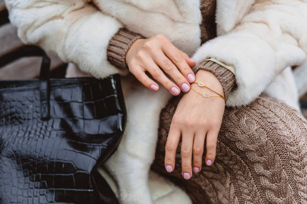 istock Elegant bracelet on female hands 670080236