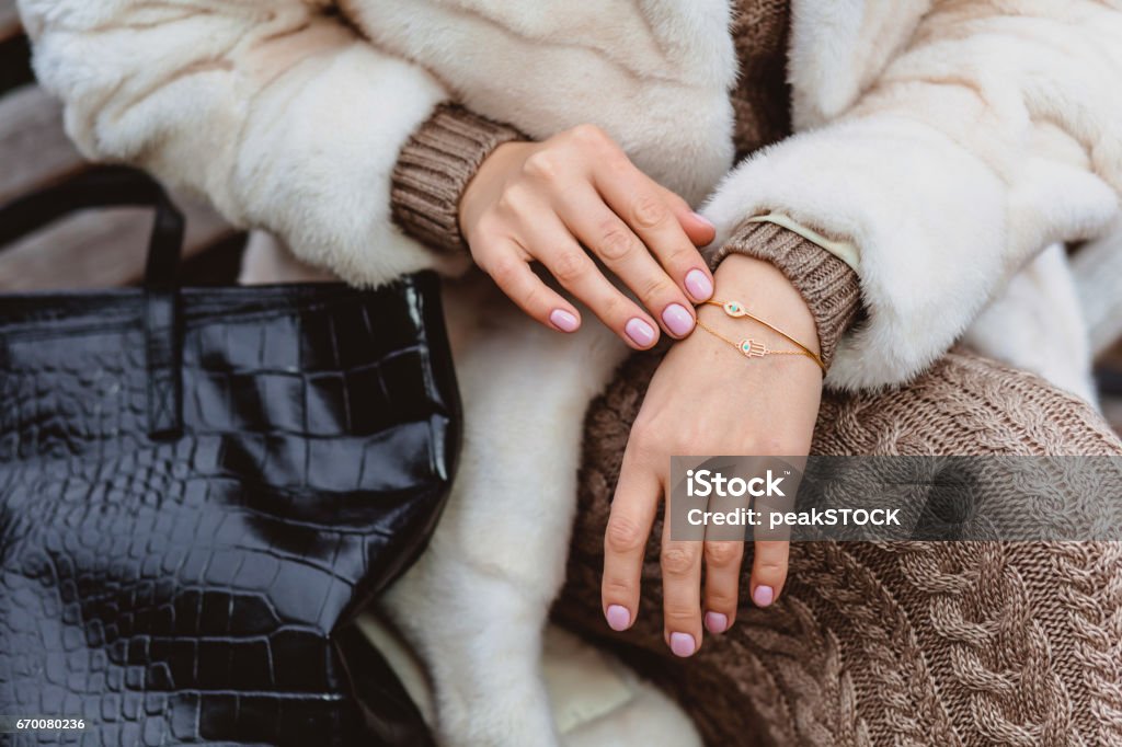 Elegant bracelet on female hands Elegant bracelet on female hands, style for luxury lady Bracelet Stock Photo