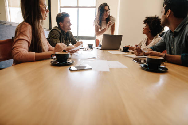 istock Multi ethnic business team meeting in conference room 670083844