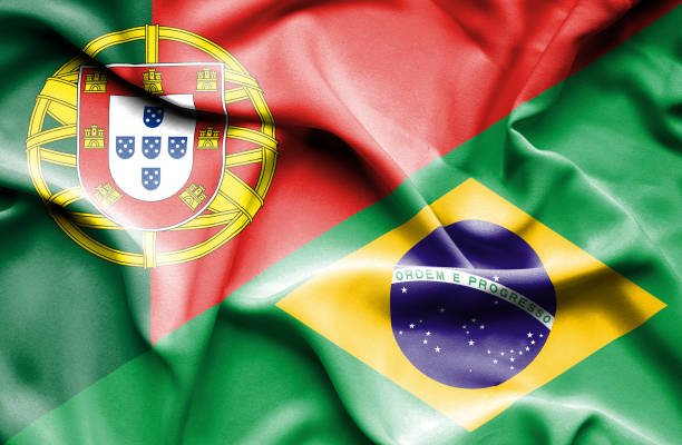развевающийся флаг бразилии и португалии - brazil serbia stock illustrations