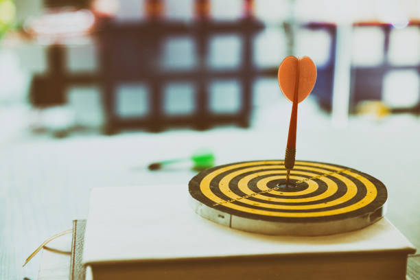 istock darts arrows hit the target center 670102062