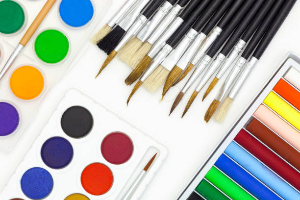 istock Paint brushes and Paints isolated on white background. 670102830