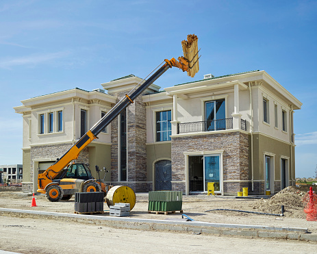 exterior shot of a construction site of a town house