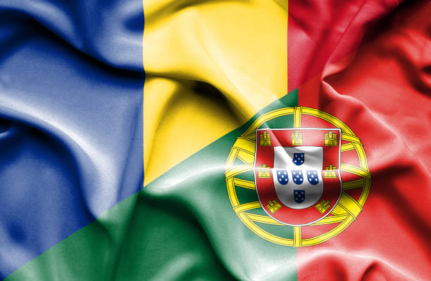 istock Waving flag of Portugal and Romania 670112642