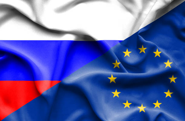 istock Waving flag of European Union and Russia 670112982