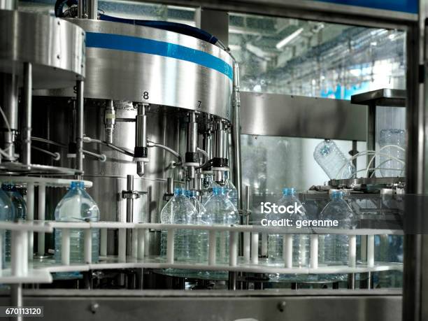 Water Bottling Factory Stock Photo - Download Image Now - Machinery, Bottle, Factory