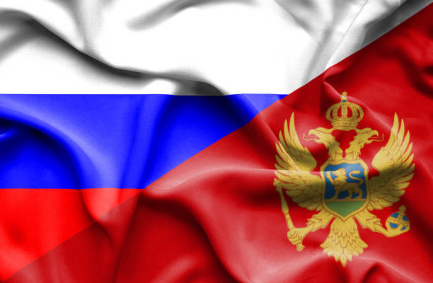 istock Waving flag of Montenegro and Russia 670113176