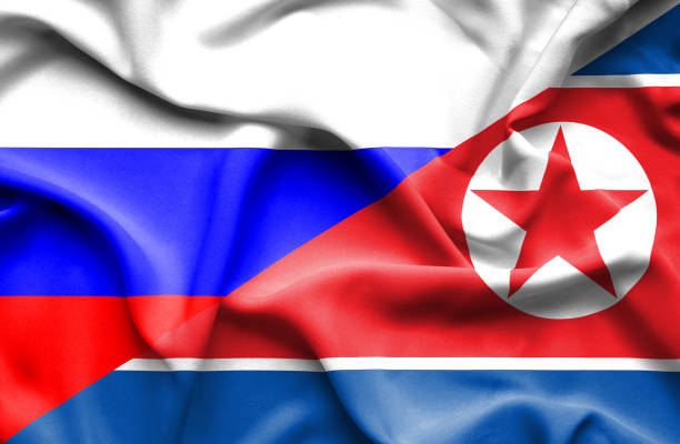 istock Waving flag of North Korea and Russia 670113216