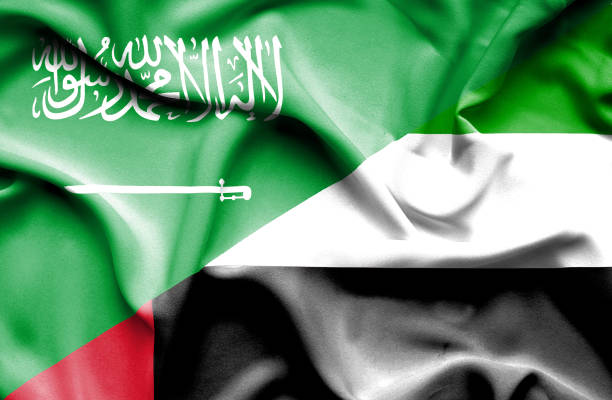 istock Waving flag of United Arab Emirates and Saudi Arabia 670115986
