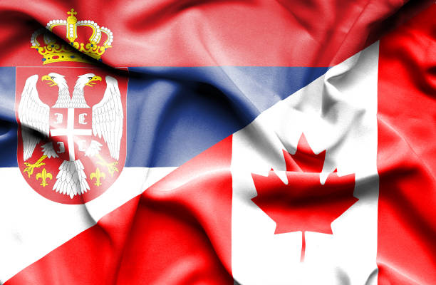 istock Waving flag of Canada and Serbia 670116940