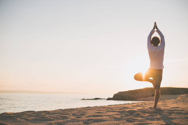 istock Handsome man exercising and stretching outdoors 670123058