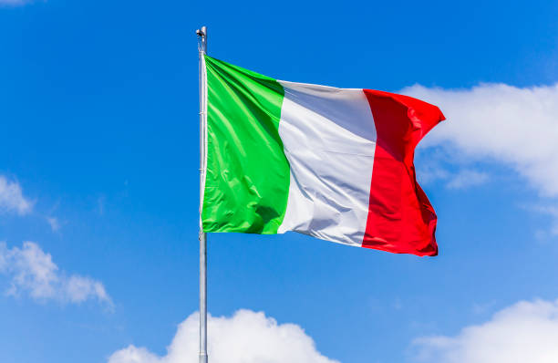 istock Italian flag waving in the sky. 670123138