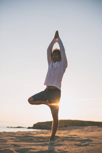 istock Meditation on sea side in summer 670123230