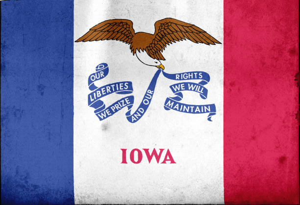 Flag of Iowa, USA with an old, vintage style Vintage style of state flags of United States of America with texture iowa flag stock illustrations