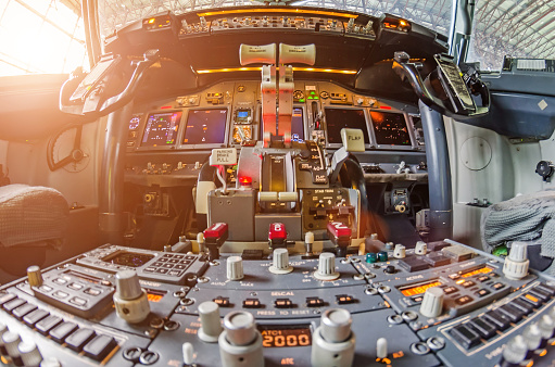Aircraft cockpit view on the control panel.