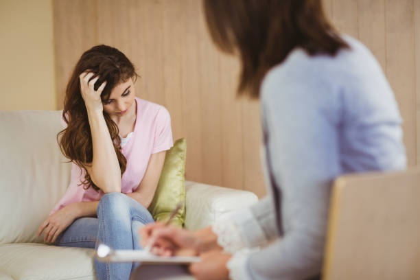 istock Therapist listening to her patient 670127782