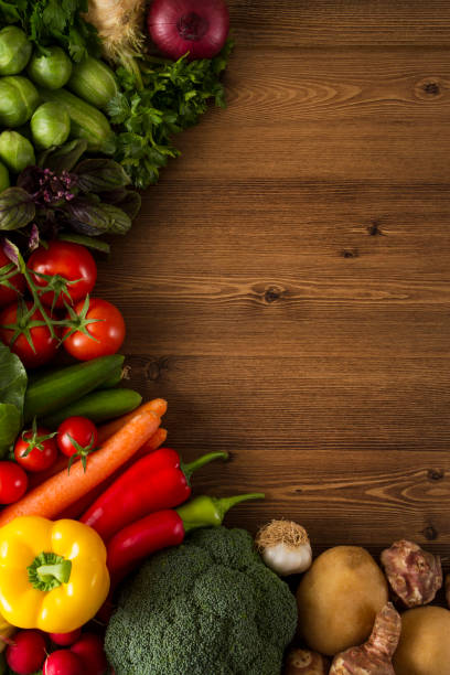 istock Healthy Fresh Vegetables on a Wooden Background 670131402