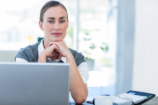 istock Thoughtful businesswoman looking at camera 670133844