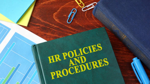 istock Book with title HR policies and procedures on a table. 670134072