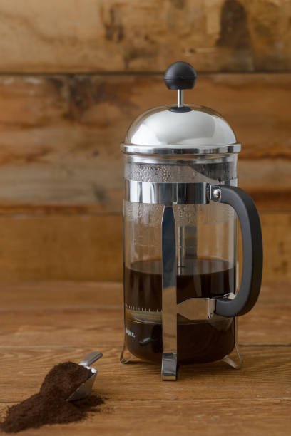 istock French press and scoop of ground coffee 670140482