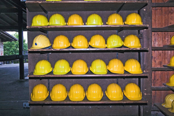 istock yellow helmets for visitors at the gem mine 670140684